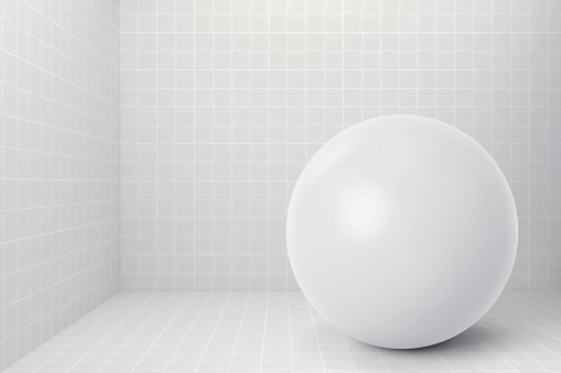 White sphere with shadow on tile background