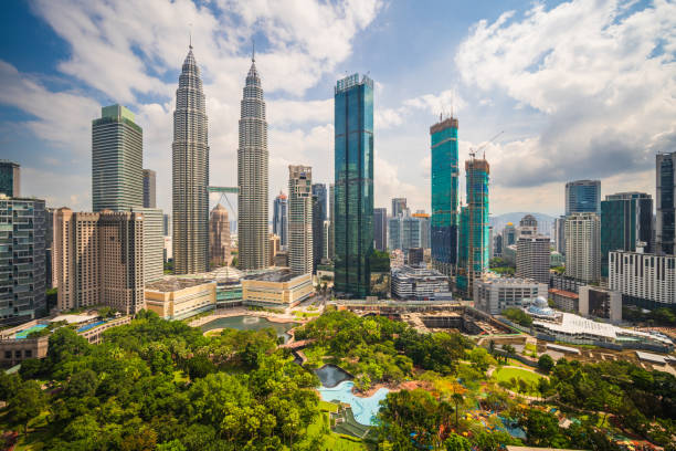 City skyline - Kuala Lumpur  panoramic view. Skyscraper of Petronas Twin Towers of Kuala Lumpur along with the other buildings  in Malaysia. twin towers malaysia stock pictures, royalty-free photos & images