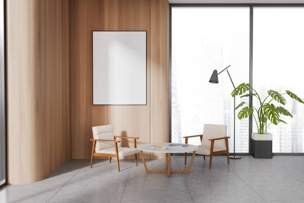 istock Wooden office waiting room with armchairs and poster 1497590849