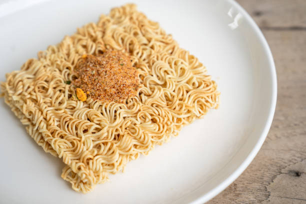 istock Instant noodles with condiments on the plate 1497591342