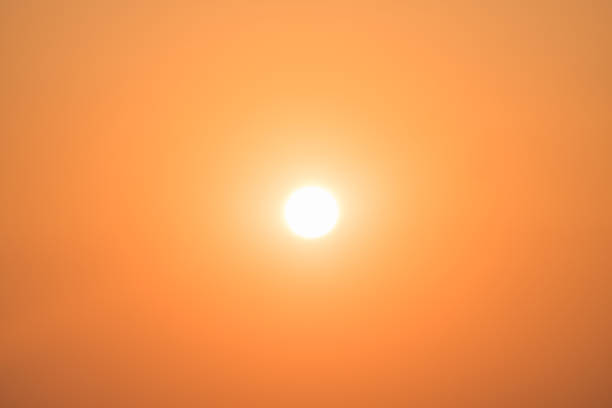 istock Orange color sky on sunset background 1497591362