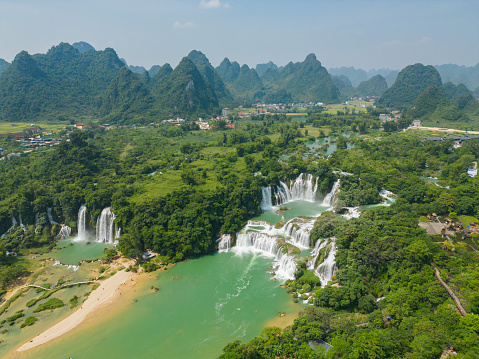 Aerial top view of Ban Gioc Water Falls in Cao Bang, Vietnam and China border. Nature landscape background. Tourist attraction landmark.