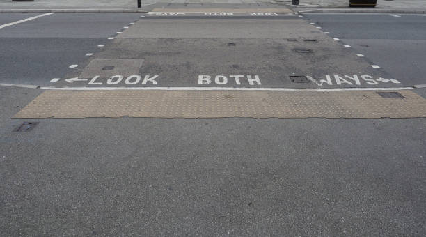istock Look both ways sign in London 1497595539