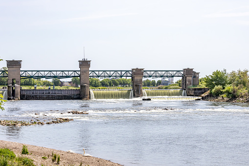 Water flowing in Borgharen dam and lock complex, waterworks to regulate river Maas