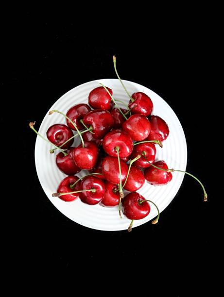 Pile of ripe and juicy red cherries