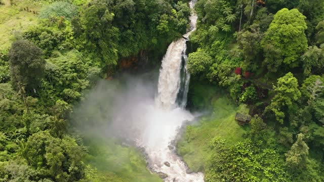 Waterfall in the rainforest. Sumatra, Indonesia.