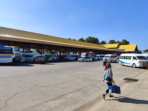 People traveling at Ubon Ratchathani bus terminal, a city in the Isan region of Thailand.