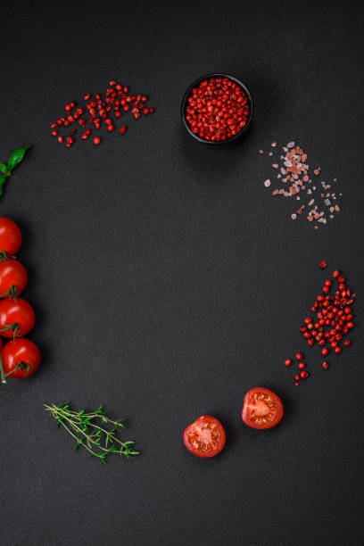 istock Ingredients for cooking cherry tomatoes, salt, spices and herbs 1497613648