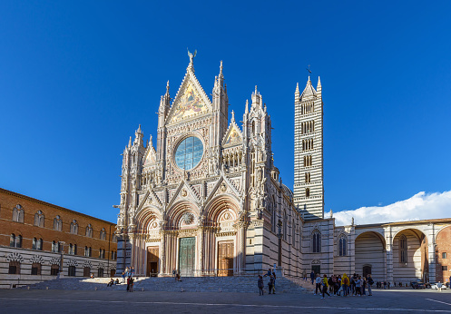 Siena, Italy - April 7, 2023: Siena Cathedral Santa Maria Assunta (Duomo di Siena). Old Town, Siena, Tuscany, Italy, Europe.