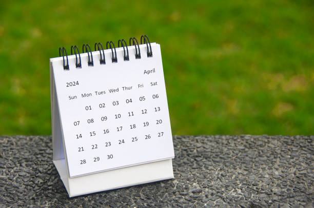 April 2024 table calendar with customizable space for text. Copy space. April 2024 table calendar with customizable space for text. Copy space. april stock pictures, royalty-free photos & images