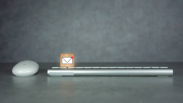 istock New email graphic on wooden block over keyboard 1497616941