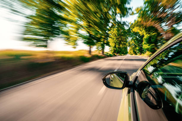 istock A car is driving on the highway, the environment is blurred 1497617104