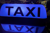 Blue Taxi sign in Poland