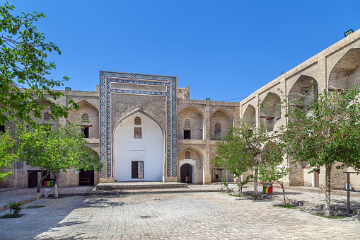 Modari Khan Madrasah built around 1567 in Bukhara, Uzbekistan. Inner courtyard
