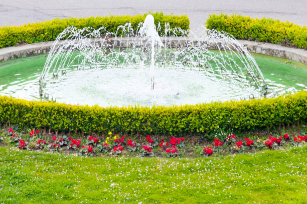 Ornamental fountain. Public park, flowerbed in Vigo, Pontevedra province, Galicia, Spain.