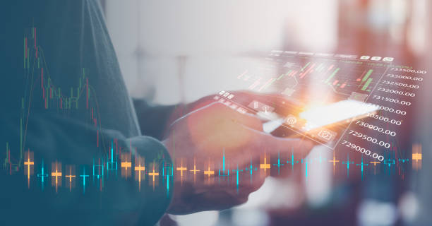 istock financial investment concept, businessman using smartphone  touching virtual trading graph buy and sell share in concept of investment business growth and marketing, cryptocurrency exchange platform 1497643454