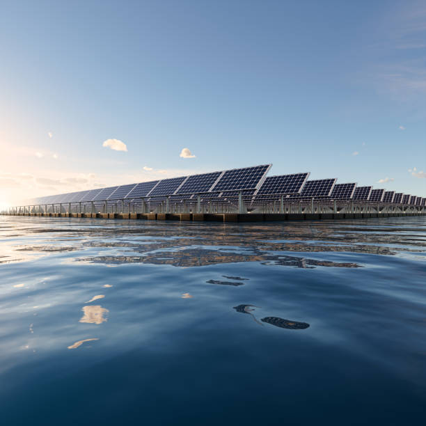 istock 3d rendering of floating solar, floatovoltaics or solar farm on water with sky background. 1497643825
