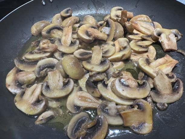 istock Mushrooms frying in a pan 1497644297