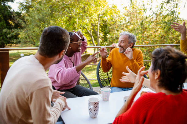 istock Mature friends play an association game 1497646289