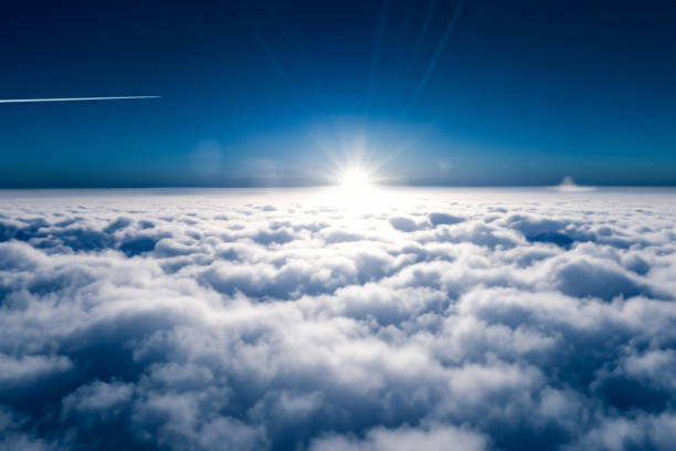 istock flying above the clouds in the sky 1497651876