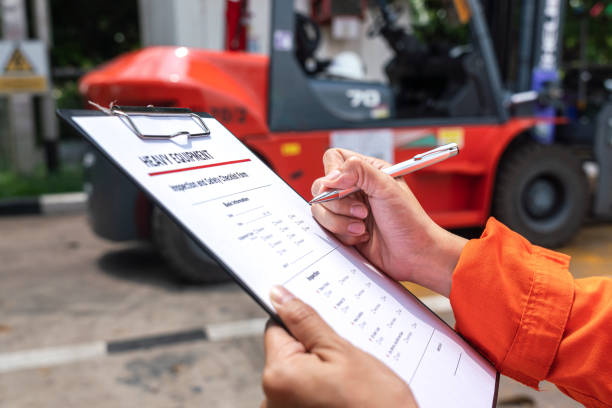 istock Safety inspecting on factory forklift vehicle. 1497653853