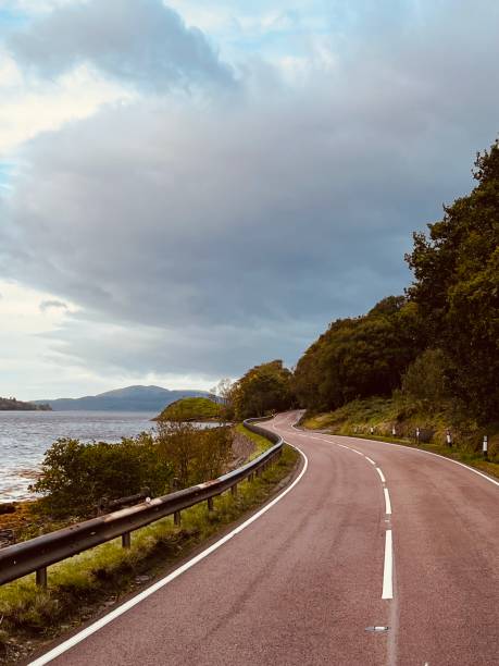 istock An empty road beside a loch in Scotland 1497654221