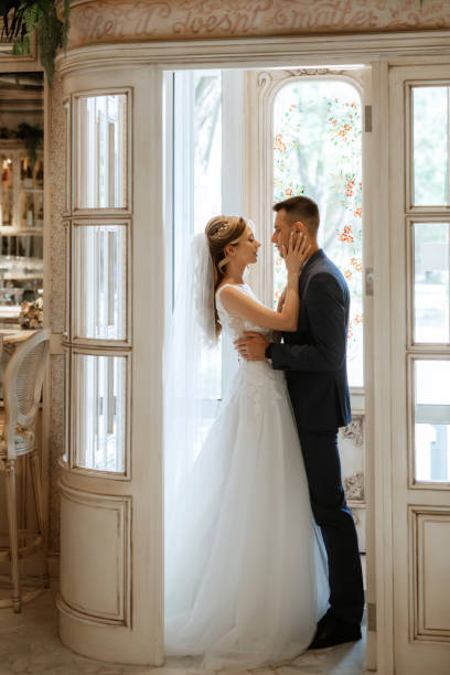 istock bride and groom inside a cocktail bar 1497654287