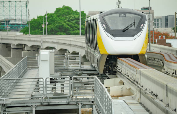 istock Elevated monorail train on rail. Public transit monorail. Modern mass transit. Electric vehicles. Rail transportation. Urban transport. Commuter train. Monorail technology. Rapid transit in the city. 1497655620