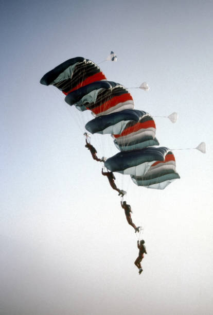 istock Skydive athletes perform above Swiss mountain landscape 1497656143