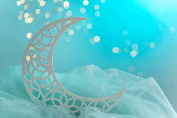 istock Beautiful crescent moon shape isolated on blue background 1497659322