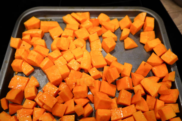 istock Cut up chunks of sweet potato on a baking tray 1497662553