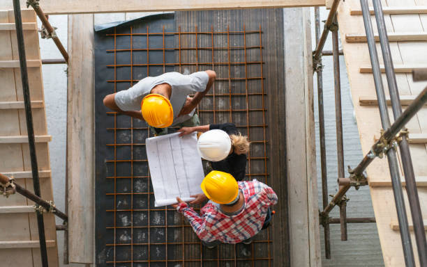 istock Female Architect, Engeneer And Foreman On A Construction Site 1497662566