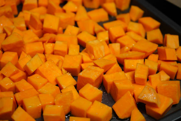 istock Cut up chunks of sweet potato on a baking tray 1497662595
