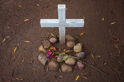 San Diego, CA, USA - Dec 29, 2022: El Campo Santo Cemetery that was built in 1849, is in Old City and claimed to be haunted. Some of the 477 tombs are buried under newly built roads years afterwards.