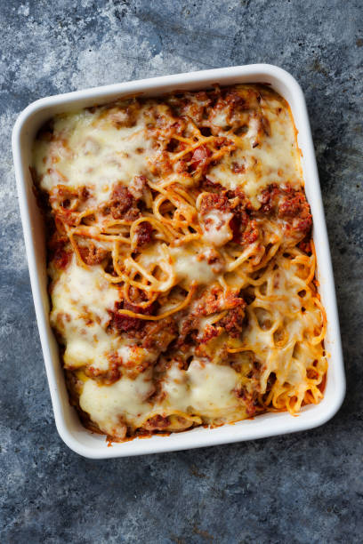 istock cheesy baked spaghetti bolognese 1497662852