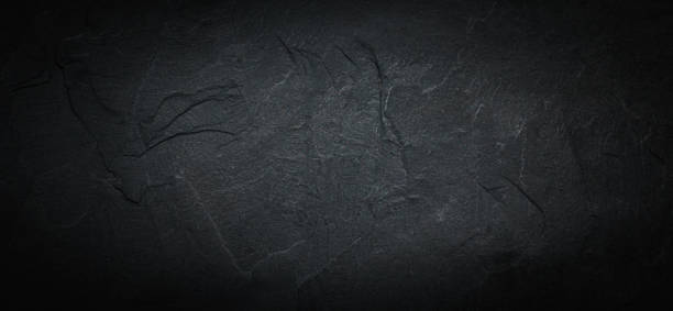 暗い灰色の石の壁の背景にデザイン用のスペース、スレート背景、黒い石のテクスチャー - blackboard chalk nobody blank ストックフォトと画像