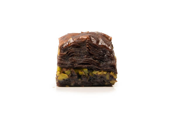 istock Turkish chocolate baklava isolated on white background. 1497666043