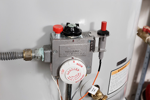 Water temperature controls on a replacement home hot water heater