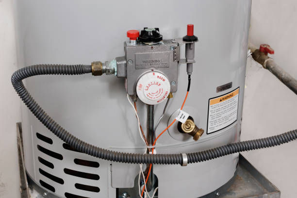 Home maintenance Water temperature controls on a hot water heater boiler stock pictures, royalty-free photos & images