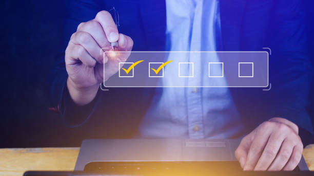istock Businessman tick correct sign mark for document approve , project acceptance and quality assurance concept, take an assessment, questionnaire, evaluation, online survey online exam check list 1497668090