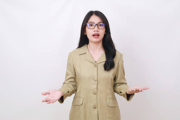 istock Wow and surprised face expression of young government worker with asking gesture 1497672715