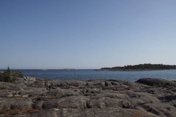 istock Scenic view of sea against clear sky 1497677554