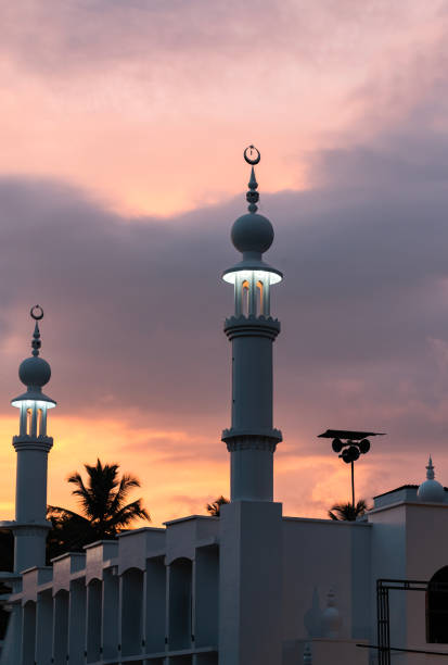 istock Colourful sunset sky with mosque view, Ramadan and Eid Mubarak background 1497677767