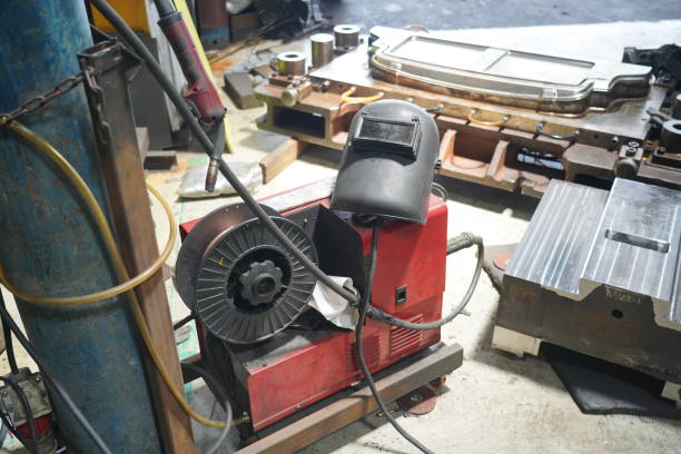 istock Welding masks in the welder's workshop. 1497681439