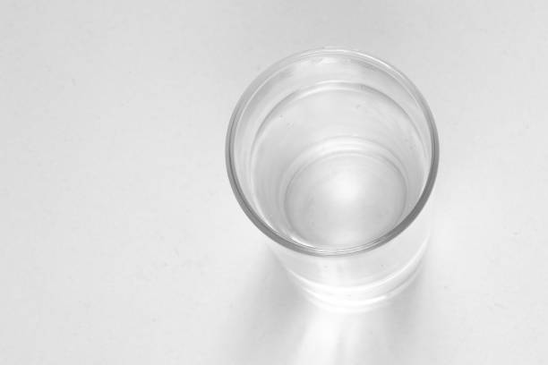 istock empty transparent glass on isolated background close-up 1497682306
