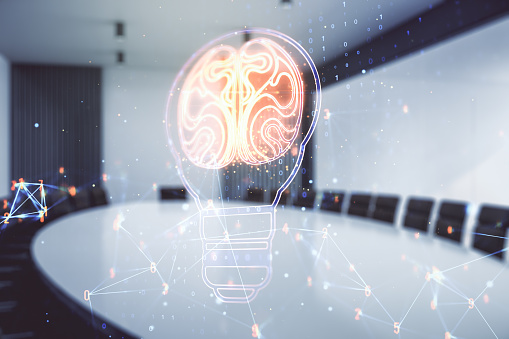 Double exposure of abstract virtual creative light bulb hologram with human brain on a modern meeting room background, idea and brainstorming concept