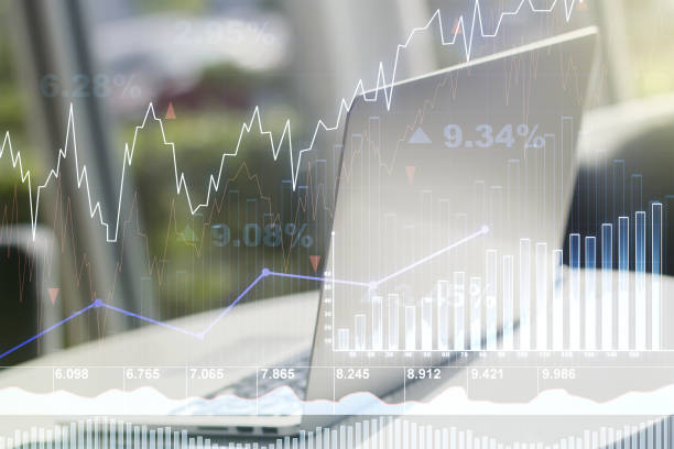 istock Abstract creative financial graph on modern laptop background, financial and trading concept. Multiexposure 1497682384