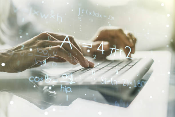 istock Double exposure of creative scientific formula concept with hands typing on laptop on background, research and development concept 1497682457