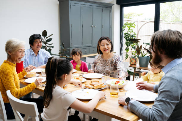 istock Smiling family ready to eat midday meal 1497682557