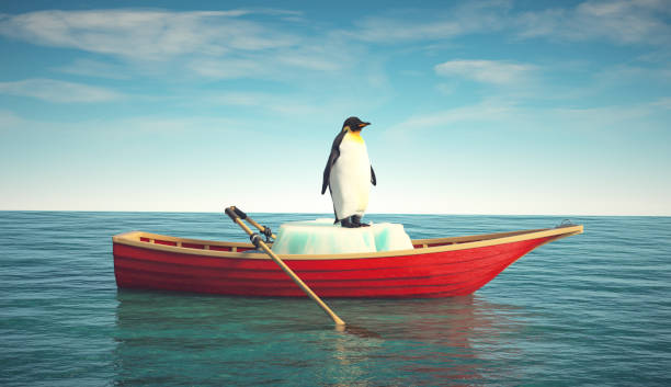 istock Penguin on a glacier in a red boat. Global warming and natural calamity. 1497684084